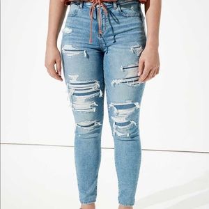 AE light wash and patched ripped jeans